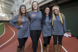 Four students on running track